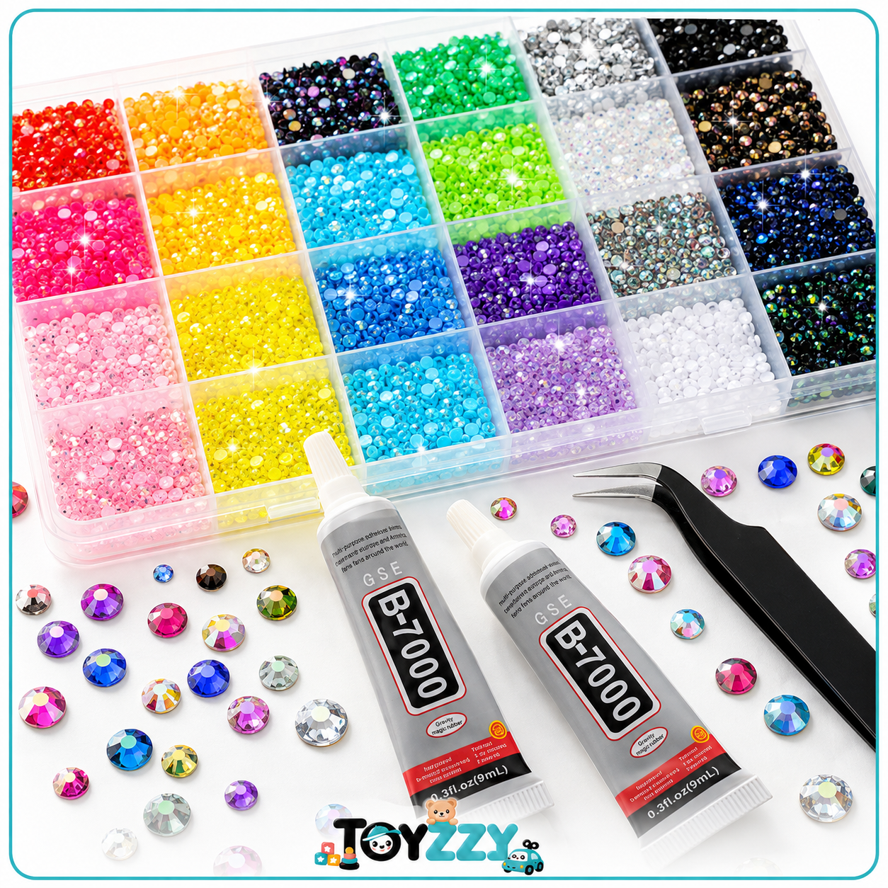 A crystal rhinestone beading kit on a white background, featuring a clear plastic organizer filled with colorful faceted beads, two tubes of Toyzz B-7000 adhesive, black tweezers, and scattered loose rhinestones.
