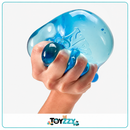 Hand pressing NeeDoh Nice Berg blue sensory squishy cube