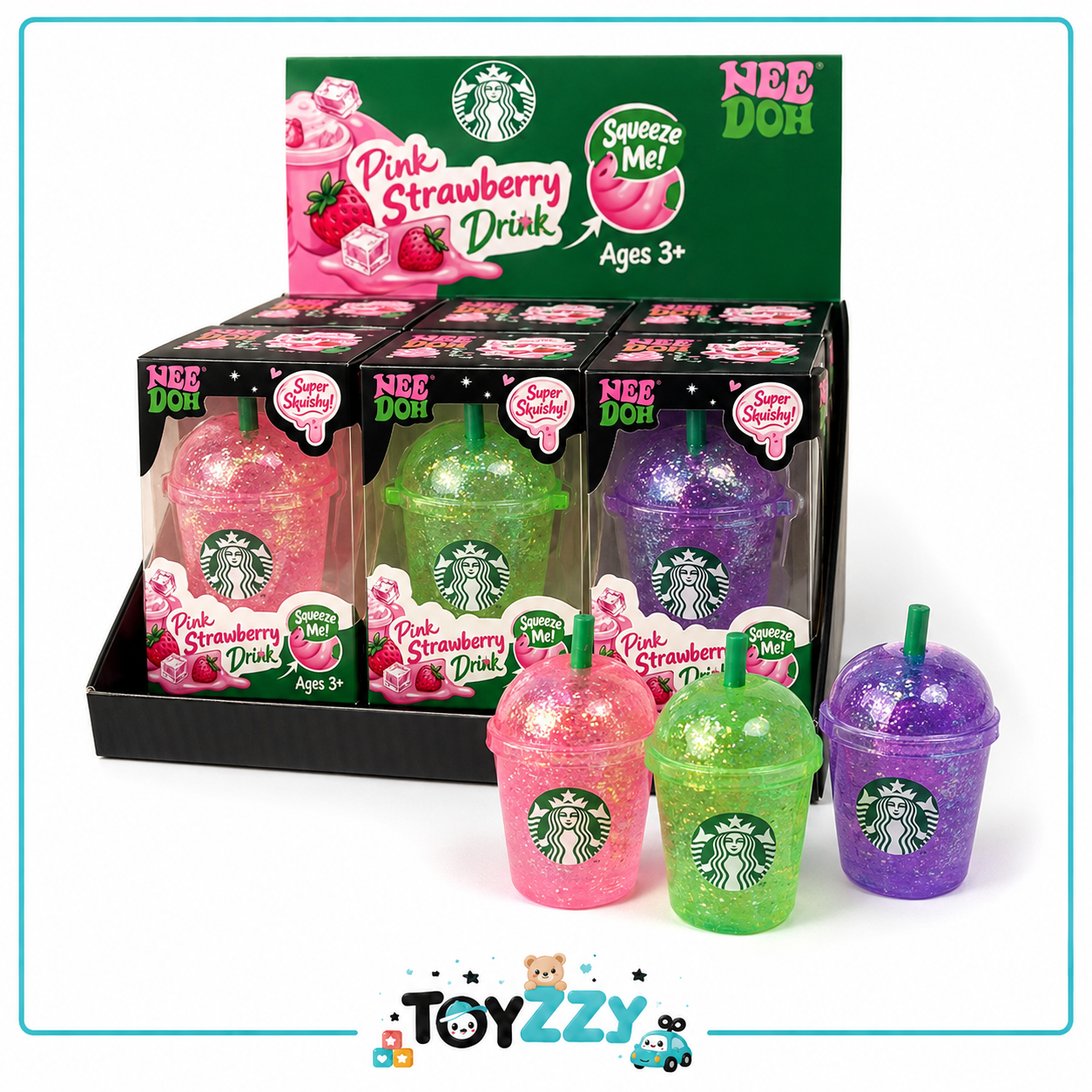 A display of Starbucks-branded Nee Doh Pink Strawberry Drink toy cups in a black retail box, with three loose toy cups in front showing pink, green, and purple glittery drink designs on a white background.