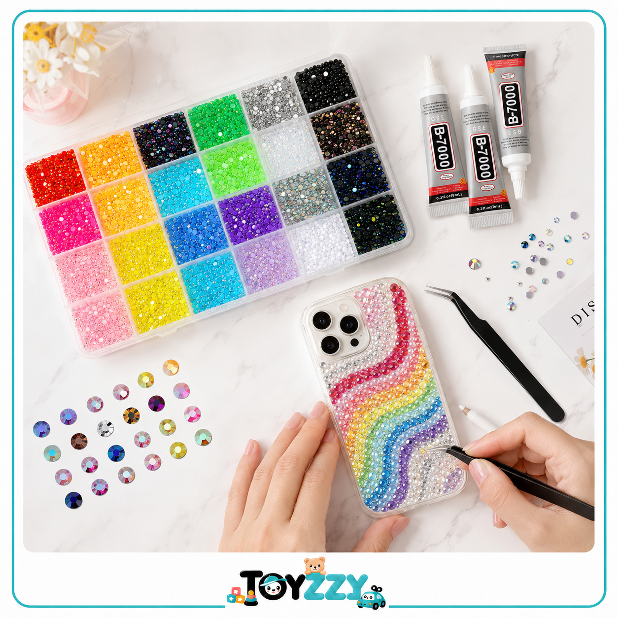 Toyzzy rhinestone craft kit used to decorate a phone case with colorful crystals